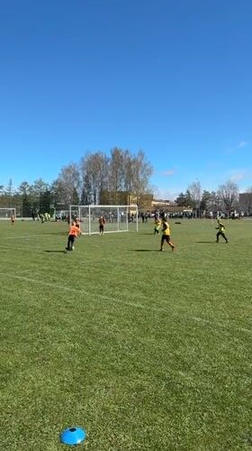 Youth soccer match played on sunny morning in Ragana