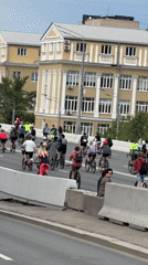 Cyclists occupy Moscow bridge lanes in organized event