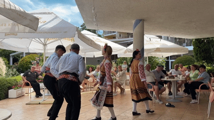 Traditional Bulgarian folk dance performed outdoors in Varna