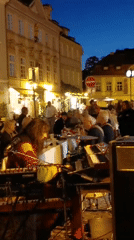 Keyboard street performance at dusk in Prague
