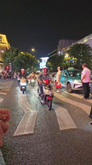 Nighttime street life and dining scenes documented in Shangcheng District