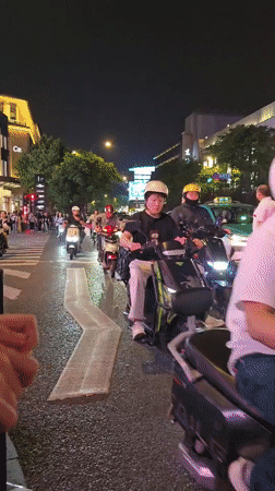 Nighttime street life and dining scenes documented in Shangcheng District