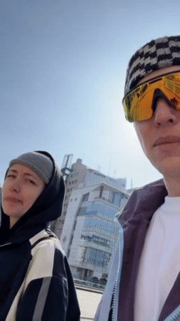 Daytime gathering and illuminated canal boats observed in Taito