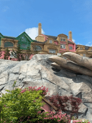Tourists document Golden Bridge Giant Hand sculpture at Ba Na Hills