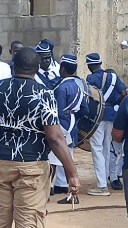 Uniformed brass band marches through Akwanga, Nigeria