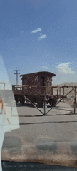 Train crosses railway intersection in Quetta, Pakistan morning hours