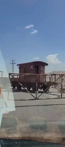 Train crosses railway intersection in Quetta, Pakistan morning hours