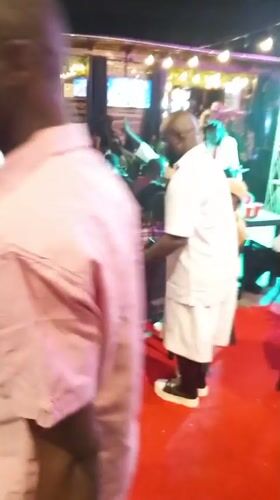 Nighttime event with stage and red carpet in Lokoja