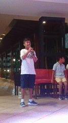 Young boy performs on stage in Juangriego, Venezuela