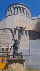 Bronze mythical sculpture on a pedestal in Montecatini Terme
