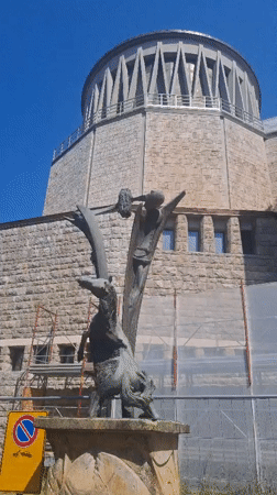 Bronze mythical sculpture on a pedestal in Montecatini Terme