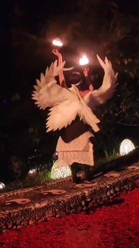 Angel-costumed fire dancer performs nighttime show in Blahbatuh, Indonesia