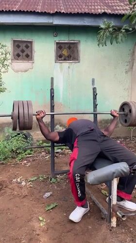 Morning outdoor weightlifting session documented in Akwanga, Nigeria