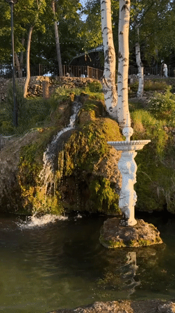 Visitor documents park fountains, sculptures, museum in Krasny Klyuch