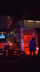 Nightlife scene at a lit-up lounge in Howayi, Nigeria