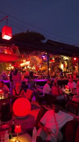 Evening dining scene at outdoor restaurant in Baan Sri Thanu