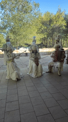 Traditional ensemble performs outdoors in Astana in ceremonial dress