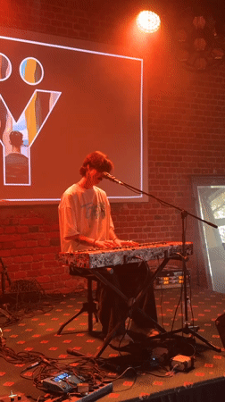 Musician performs keyboard set at Moscow bar venue