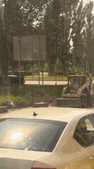 Urban life moments: construction vehicle, commuters, bus passenger observed