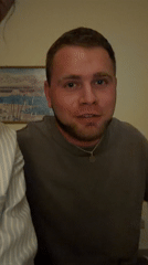 Man expresses shame, covers face in emotional moment