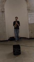 Saxophone session and monumental bas-relief sculptures in public spaces