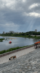 Witness documents Kurgan cityscape including river, sculpture, church