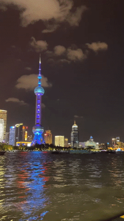 Night stroll through Hongkou: skyline views, public art, giant PUBG statue