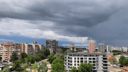 Storm clouds gather over Plovdiv cityscape