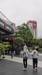 Ordinary afternoon activity captured at Sochi restaurant exterior