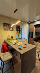 Women prepare Asian-style meal in Birobidzhan kitchen