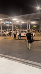 Nighttime airport waiting area documented in Hanoi