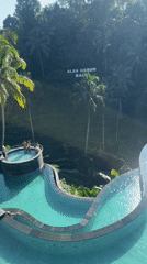 Tourists enjoy pools and coffee tours at Bali agrotourism site