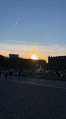Berliners gather at Lustgarten park for sunset viewing