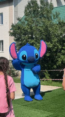 Stitch mascot and color powder fun at Altai summer event