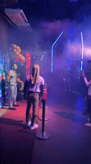 Early morning neon-lit event draws crowds in San Diego, Venezuela
