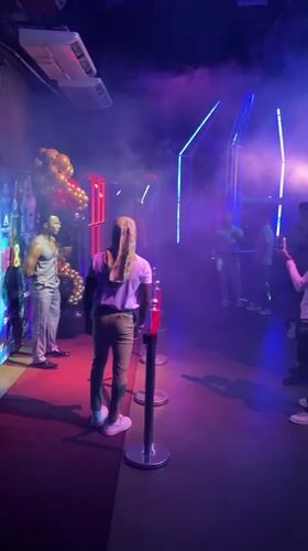 Early morning neon-lit event draws crowds in San Diego, Venezuela