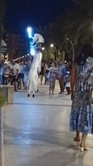 Summer night on Roseto degli Abruzzi's promenade, fountains and all