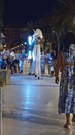 Summer night on Roseto degli Abruzzi's promenade, fountains and all