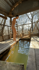 Woman enters green pool in Ulyanovsk, Russia