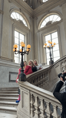 Fashion photo shoot on ornate Milan staircase