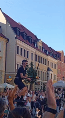 Fire juggling act on a Wrocław street platform