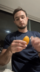 Man enjoys fresh fruit in early morning Mexico scene