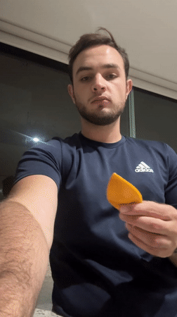 Man enjoys fresh fruit in early morning Mexico scene