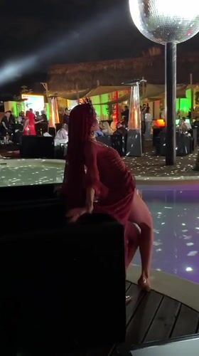 Traditional dancing performances captured at poolside venue in Armenia