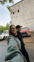 Early morning walk captured on rainy Saint Petersburg streets