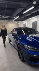 Professional car shoot featuring woman and BMW at Warsaw facility