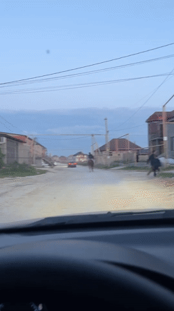 Vehicle spotted on dusty rural road in Kaspiysk