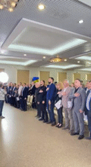 Formal ceremony with hand-over-heart gesture held in Irpin hall