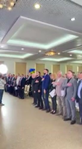 Formal ceremony with hand-over-heart gesture held in Irpin hall
