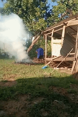 Rural Kenyan family conducts daily household chores and meal preparation